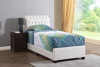 Tufted Upholstered Bed with white headboard and blue quilt by window on Tampa Home & Garden Store