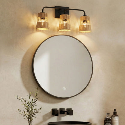 Moonlit 3-light wall sconce with woven wicker shades on a black metal bar above a round mirror on Tampa Home & Garden Store