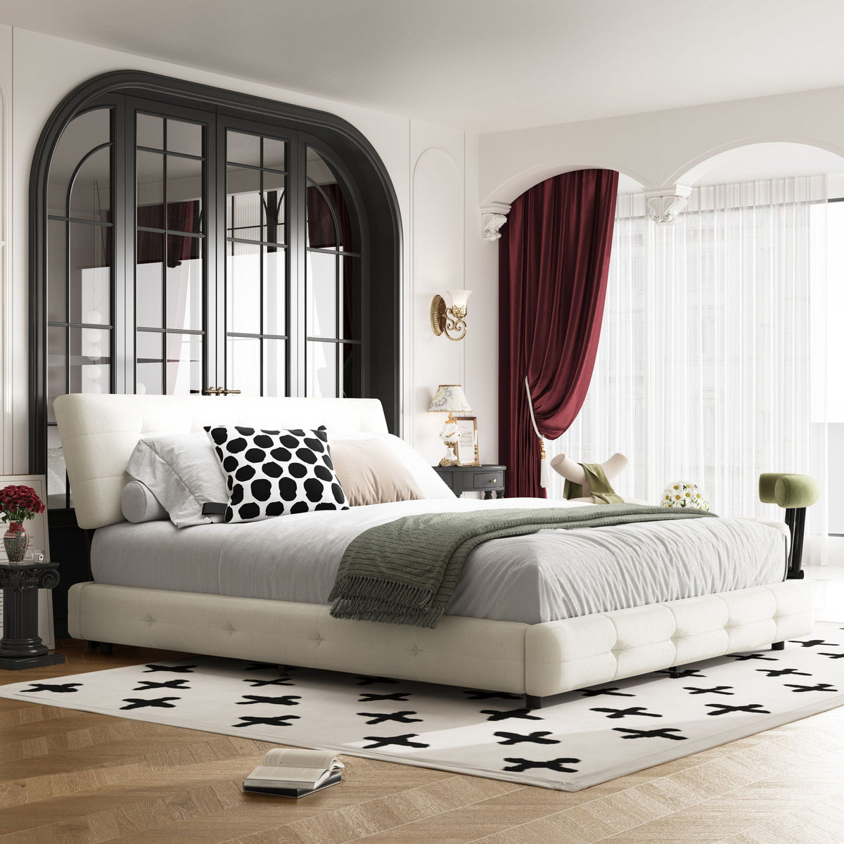 Tufted headboard upholstered bed with white fabric and cloud pillow design in a scene on Tampa Home & Garden Store