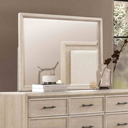 Oak 8-drawer dresser with mirror; light finish with books, model airplane, and vase of branches on Tampa Home & Garden Store
