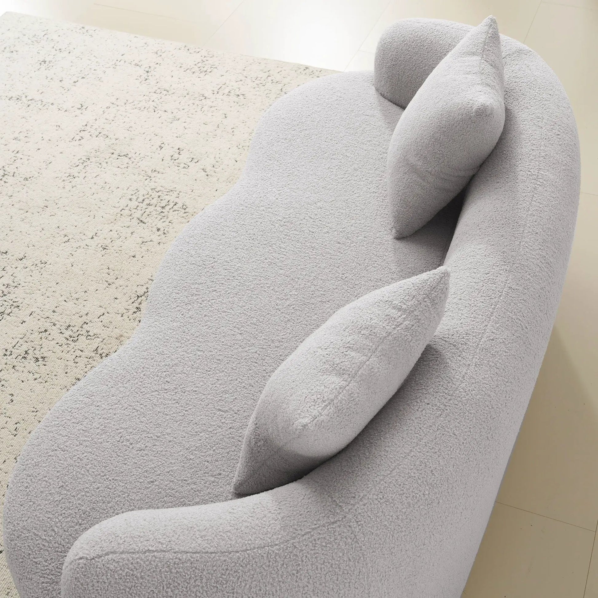 Curved loveseat sofa with round armrest in light gray boucle fabric, stationary by Unique Piece on Tampa Home & Garden Store