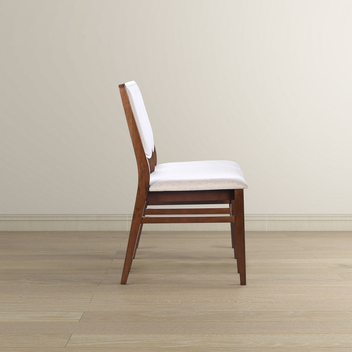 Beige linen dining chair with padded seat and wooden legs on Tampa Home & Garden Store