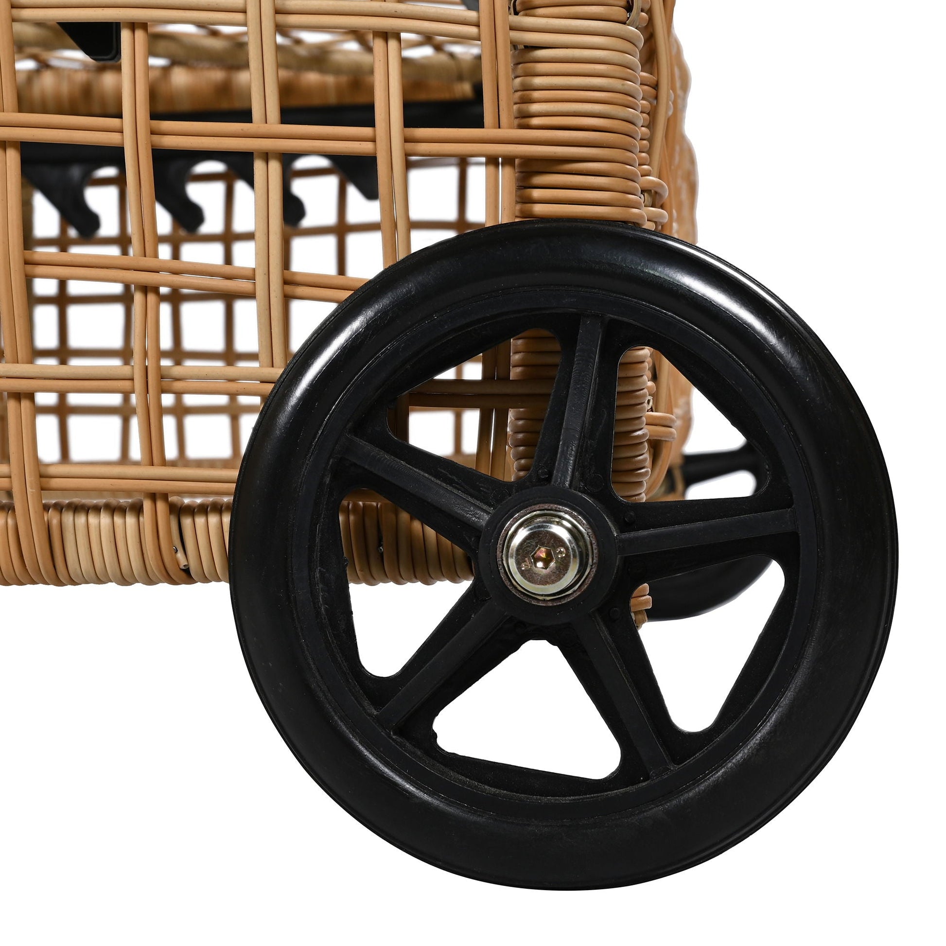 Outdoor lounge chair in natural wicker with black wheel detail on Tampa Home & Garden Store