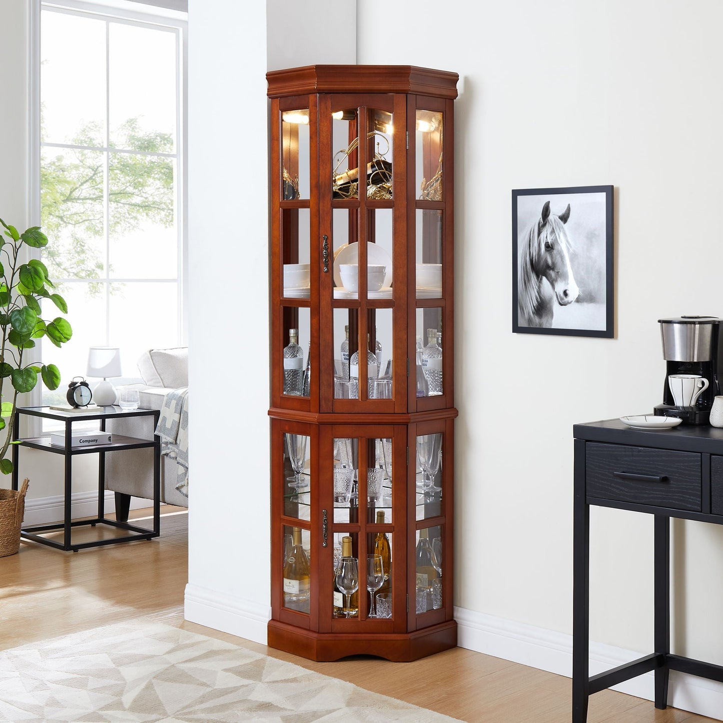 Corner curio cabinet with 5 glass shelves and built-in lighting in warm wood finish on Tampa Home & Garden Store