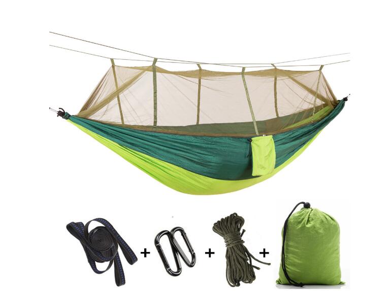 Parachute hammock in army-green with mosquito net; includes straps, carabiners, rope and bag on Tampa Home & Garden Store