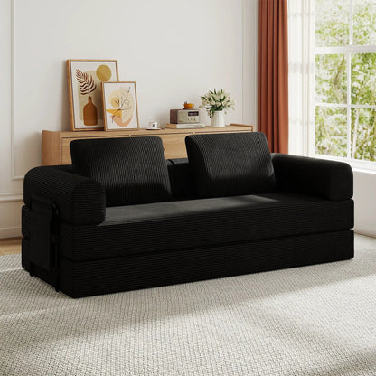 Futon sofa in black ribbed upholstery in a bright living room with wood console on Tampa Home & Garden Store