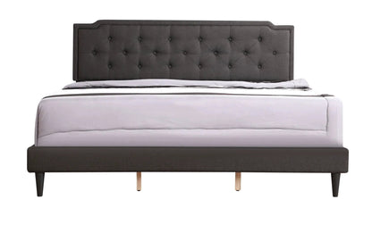 Button tufted upholstered bed in charcoal gray fabric with diamond headboard and wood legs on Tampa Home & Garden Store