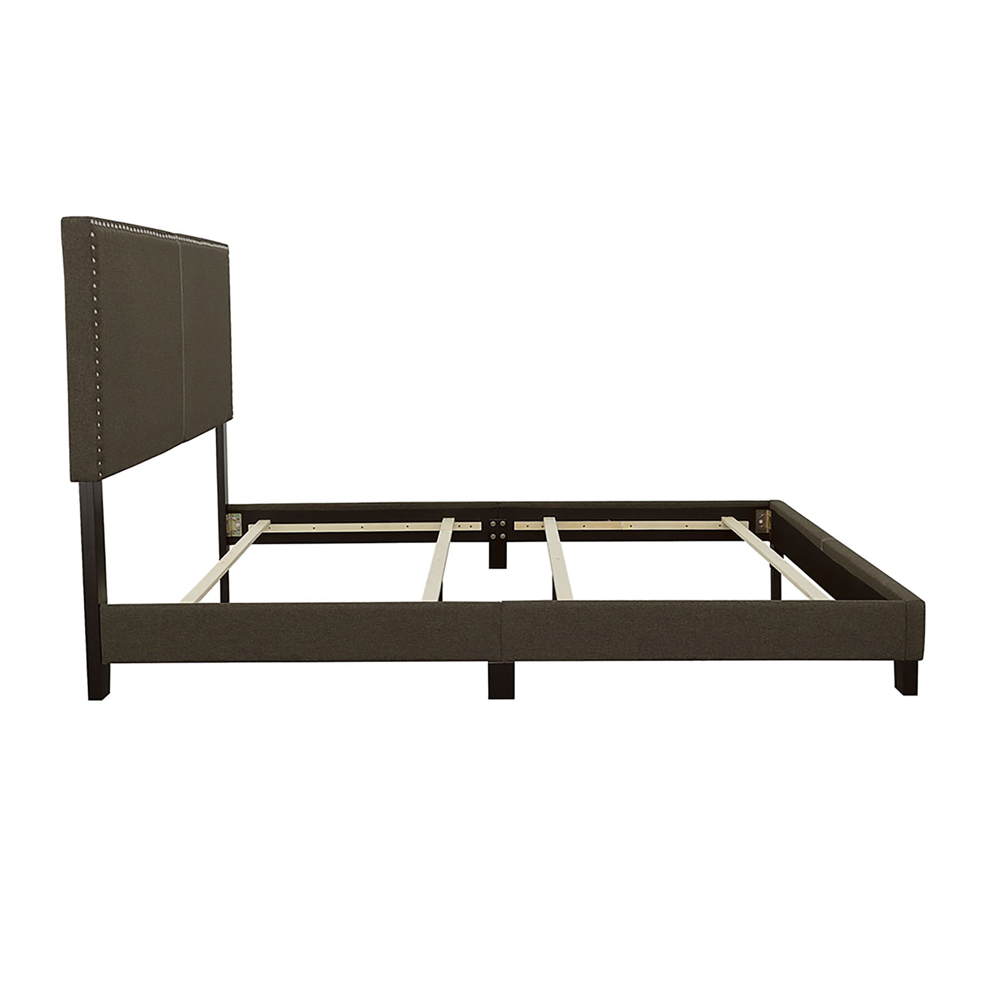 Queen bed with charcoal upholstered headboard featuring nailhead trim and metal legs on Tampa Home & Garden Store