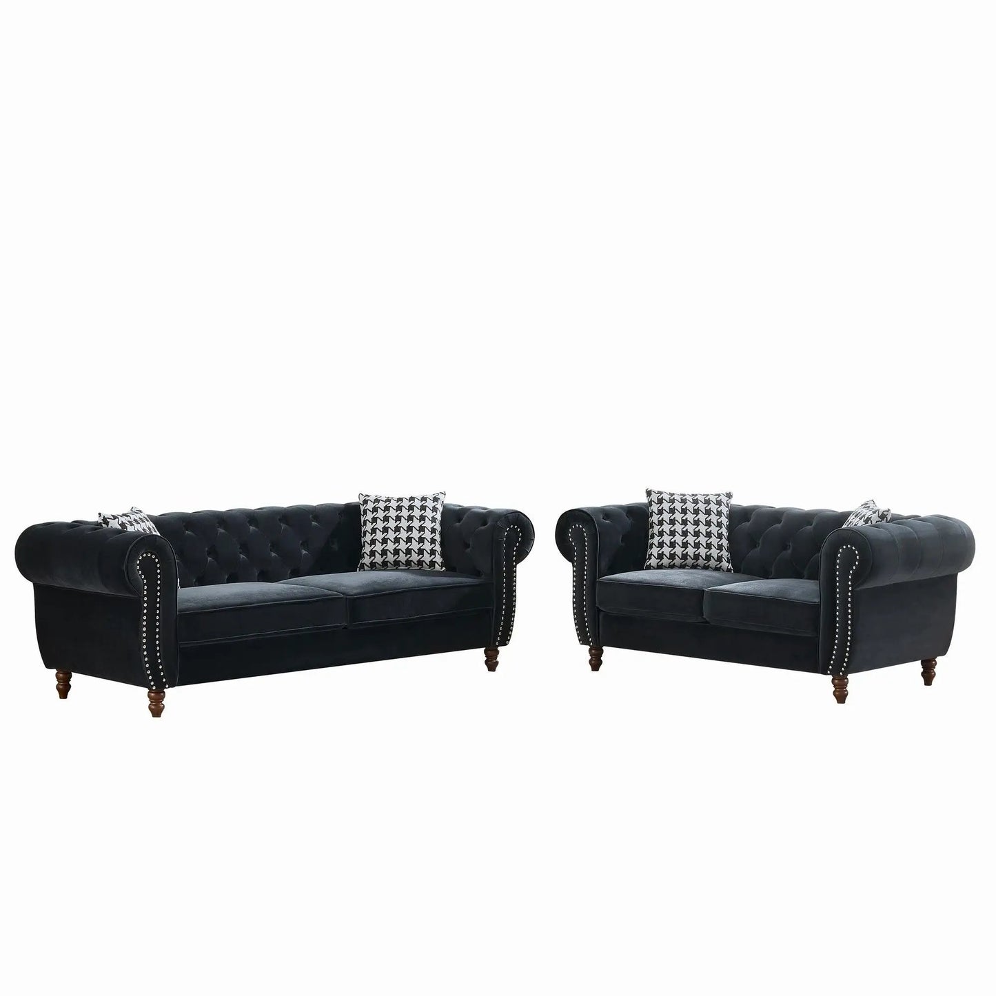 Chesterfield 3- and 2-seat fabric sofas with black tufted upholstery, roll arms and nailhead trim on Tampa Home & Garden Store