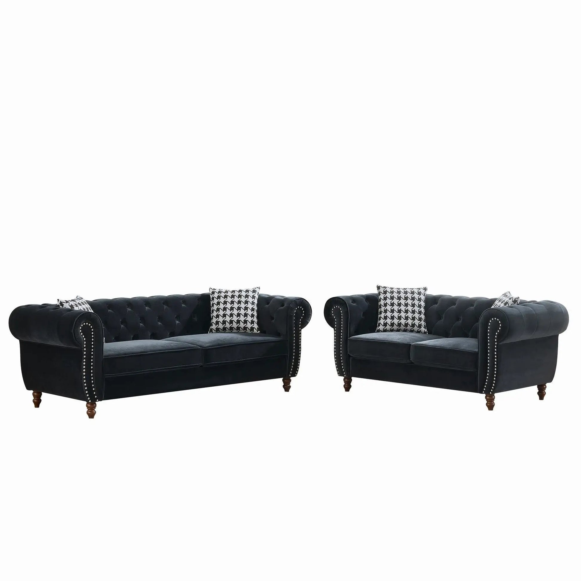 Chesterfield 3- and 2-seat fabric sofas with black tufted upholstery, roll arms and nailhead trim on Tampa Home & Garden Store