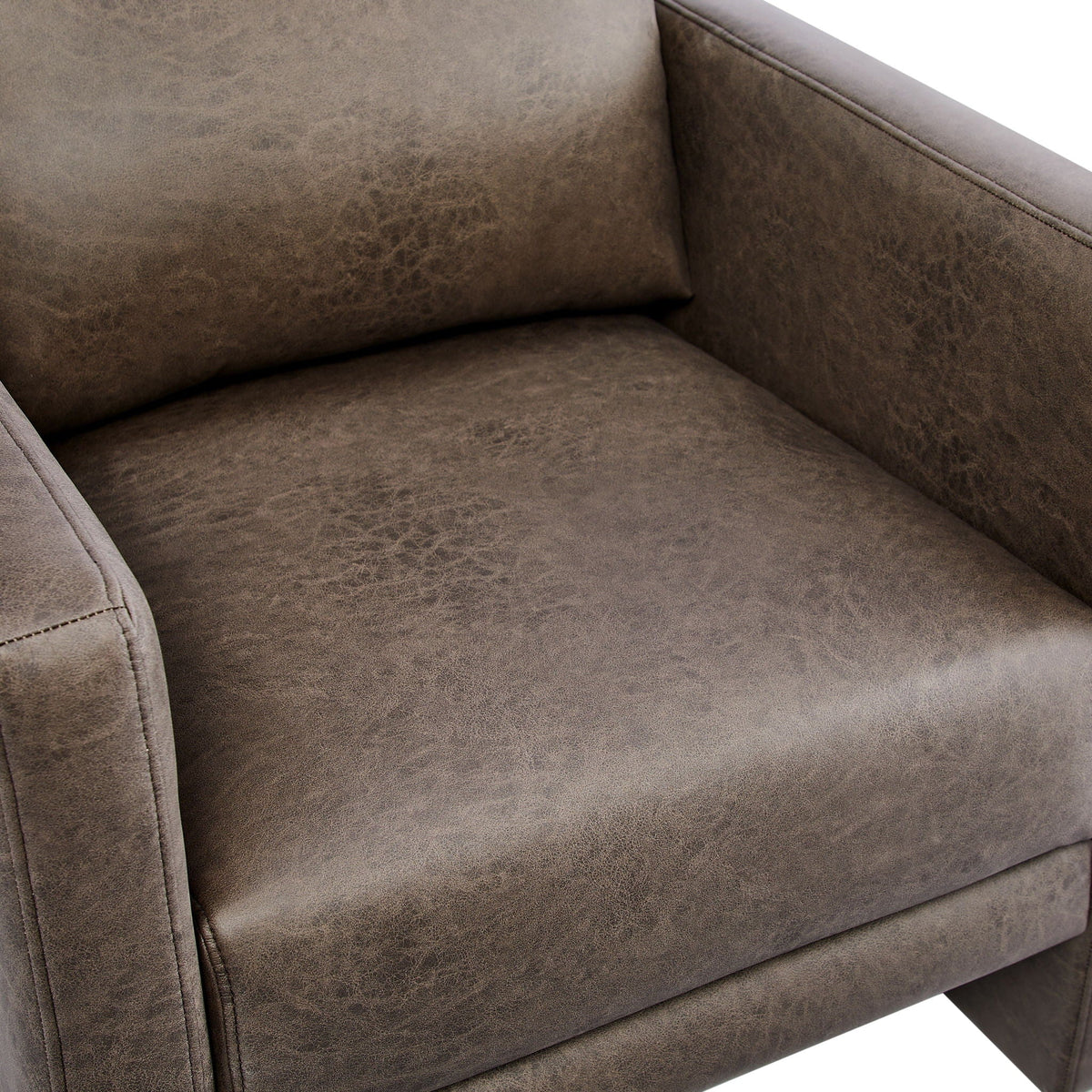 Tulo Arm Chair brown distressed leather-look upholstery with stitched edges on Tampa Home & Garden Store