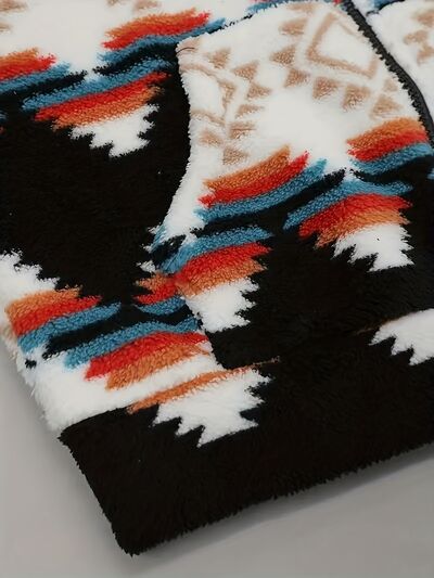 Geometric zip-up sherpa jacket by Stevvex close-up fabric pattern in black white red blue on Tampa Home & Garden Store