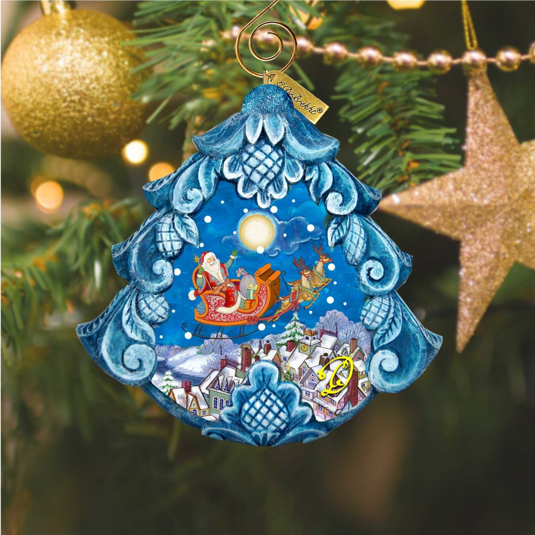 All a Good Night sculpted ornament by G. DeBrekht featuring Santa sleigh over blue village on Tampa Home & Garden Store