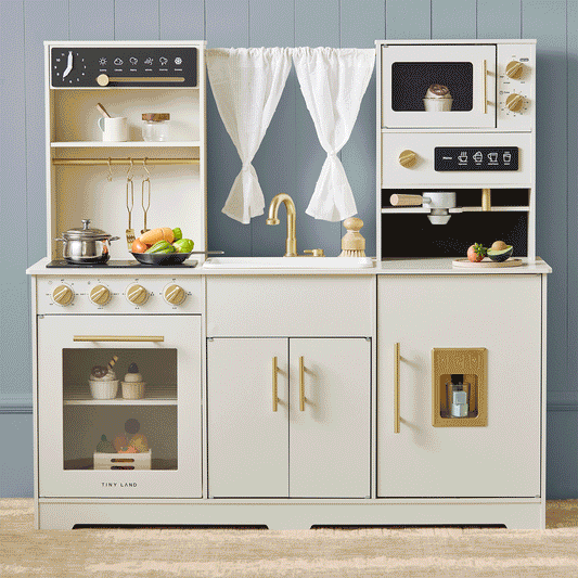 Tiny Land play kitchen with running water in aqua cream; stove, sink, and hanging utensils on Tampa Home & Garden Store