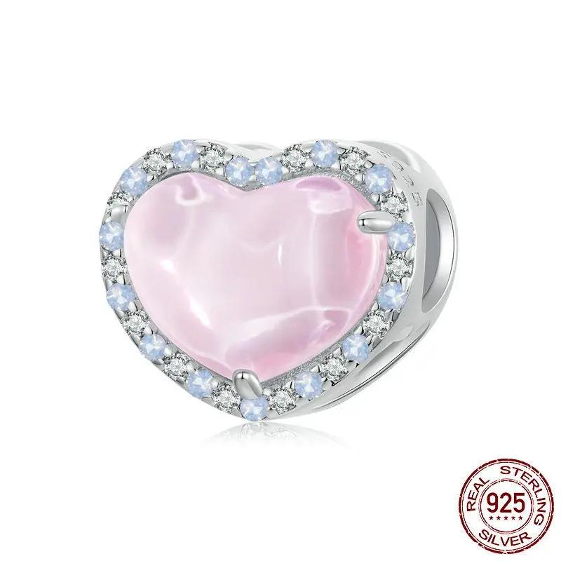 Heart-shaped pink mother-of-pearl charm bead with crystal halo and blue accents in 925 silver on Tampa Home & Garden Store