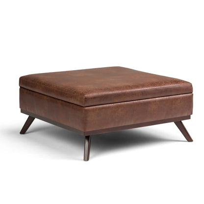 Owen Multifunctional Square Storage Ottoman in brown faux leather with angled legs on Tampa Home & Garden Store