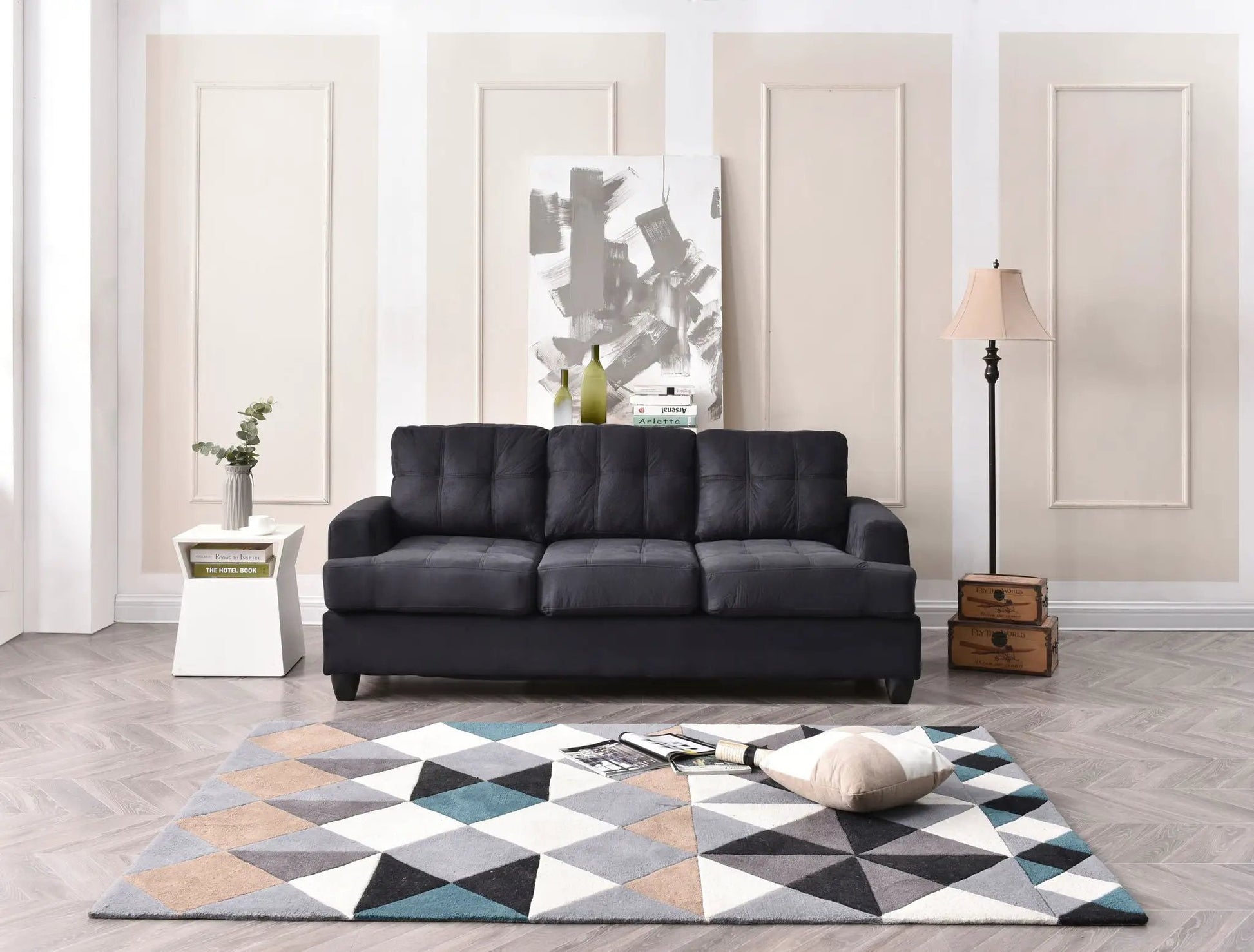 Sandridge sofa; dark charcoal tufted stationary sofa by Unique Piece Furniture in lounge on Tampa Home & Garden Store