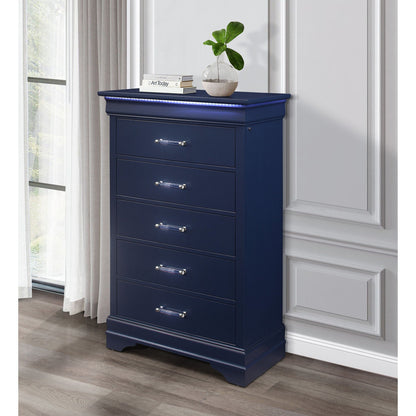 Charlston Accent Chest with LED lighting in navy blue finish; books and vase atop on Tampa Home & Garden Store