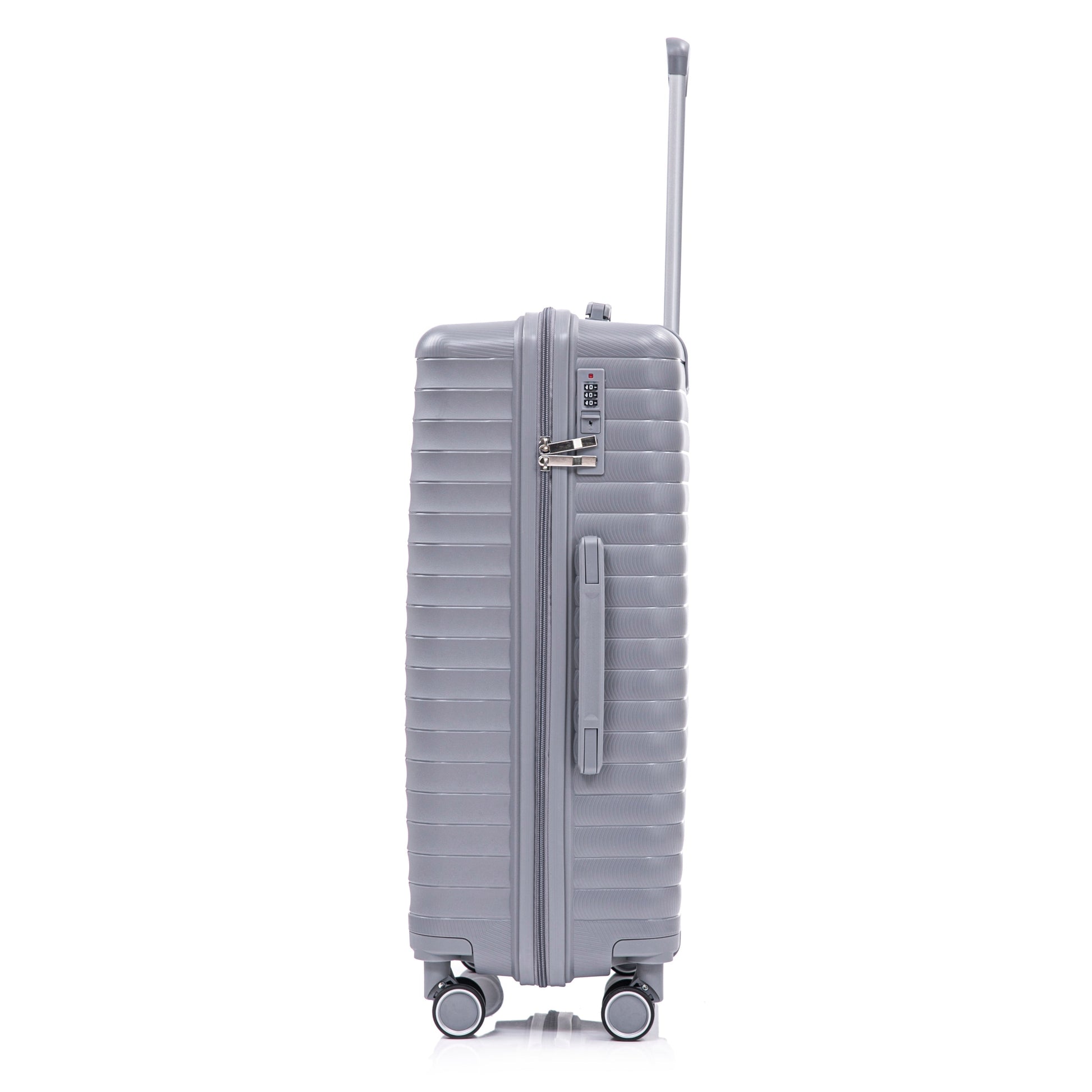 Light gray hard-shell spinner suitcase with extendable handle and four wheels on Tampa Home & Garden Store