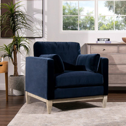 Two Knox Modern Farmhouse Arm Chairs in navy velvet with light wood legs on Tampa Home & Garden Store