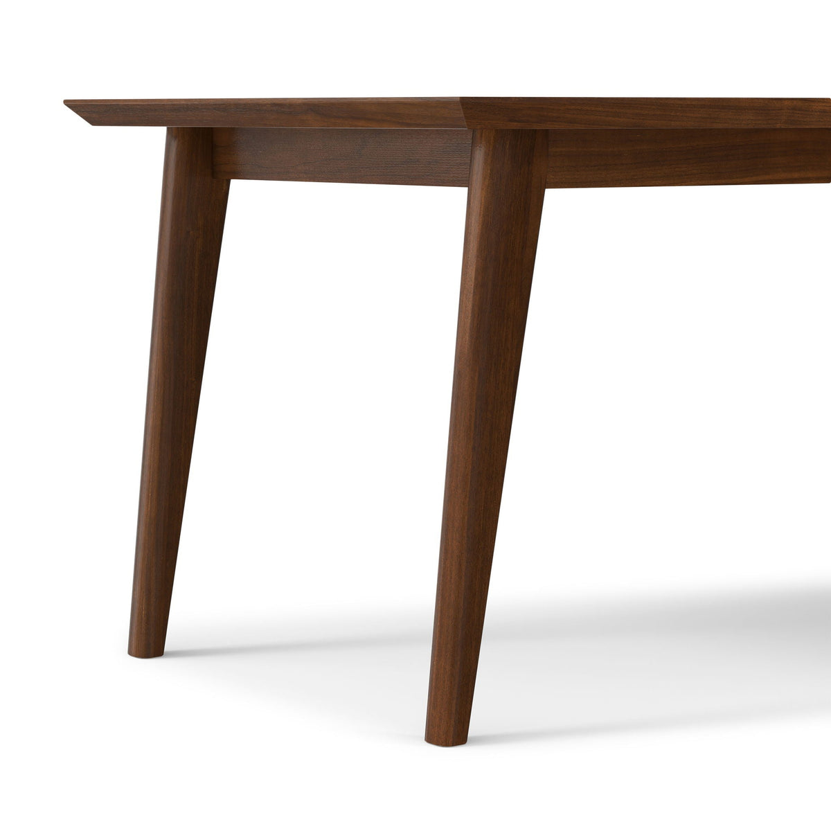 Rectangular dining table in dark brown wood with tapered legs on Tampa Home & Garden Store