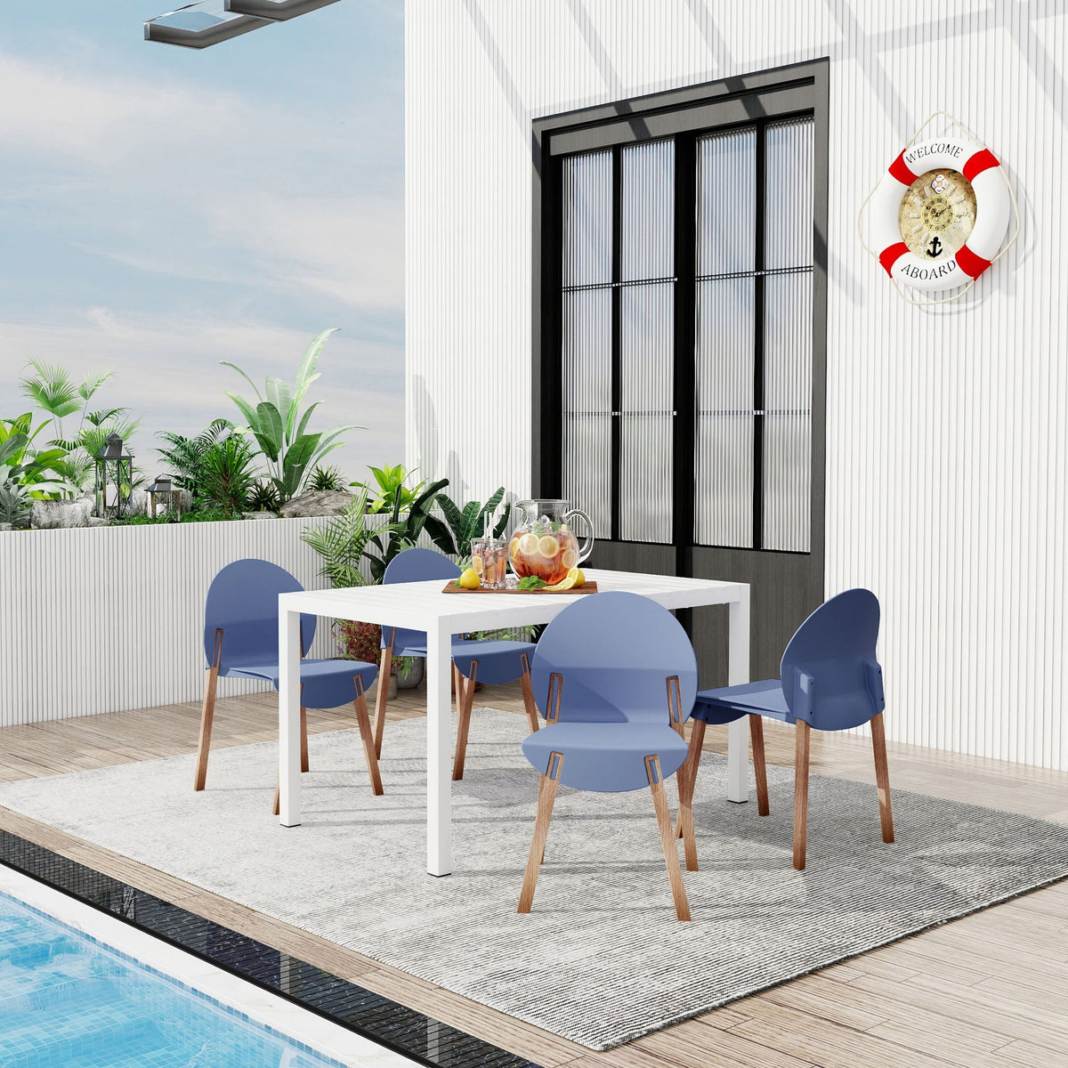 4 piece outdoor set with ergonomic blue polypropylene chairs and white table by pool on Tampa Home & Garden Store