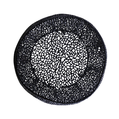 Round coffee table with black aluminum frame and intricate lattice top on Tampa Home & Garden Store