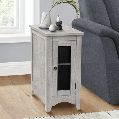 Accent End Table in light gray washed wood with mesh panel beside a chair on Tampa Home & Garden Store