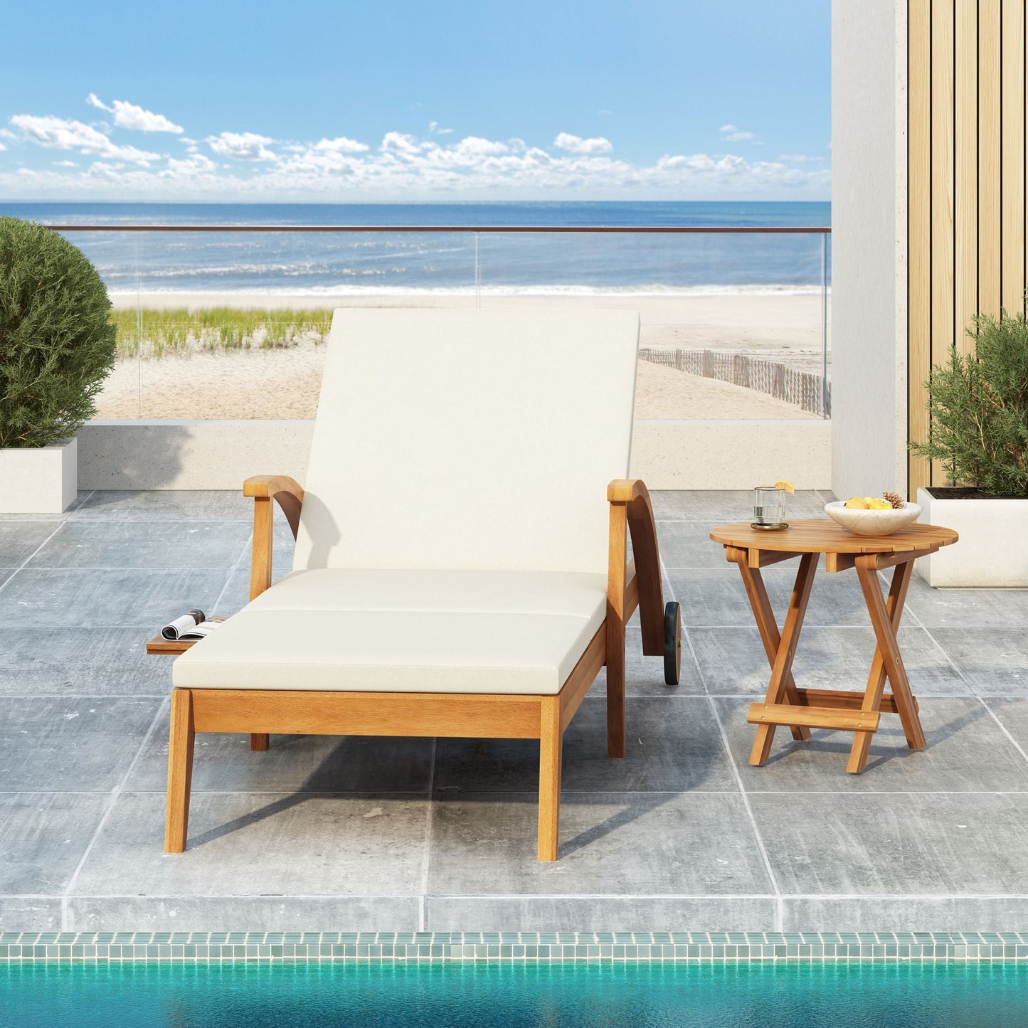 Versatile cream chaise lounge with an acacia wood frame and wheels on a seaside patio on Tampa Home & Garden Store