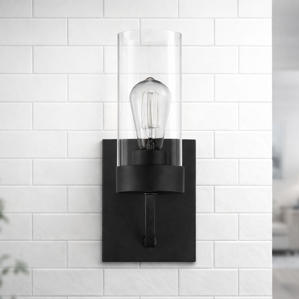 Zephyr single light sconce in black metal with clear glass cylinder shade by HouseOfZazla on Tampa Home & Garden Store