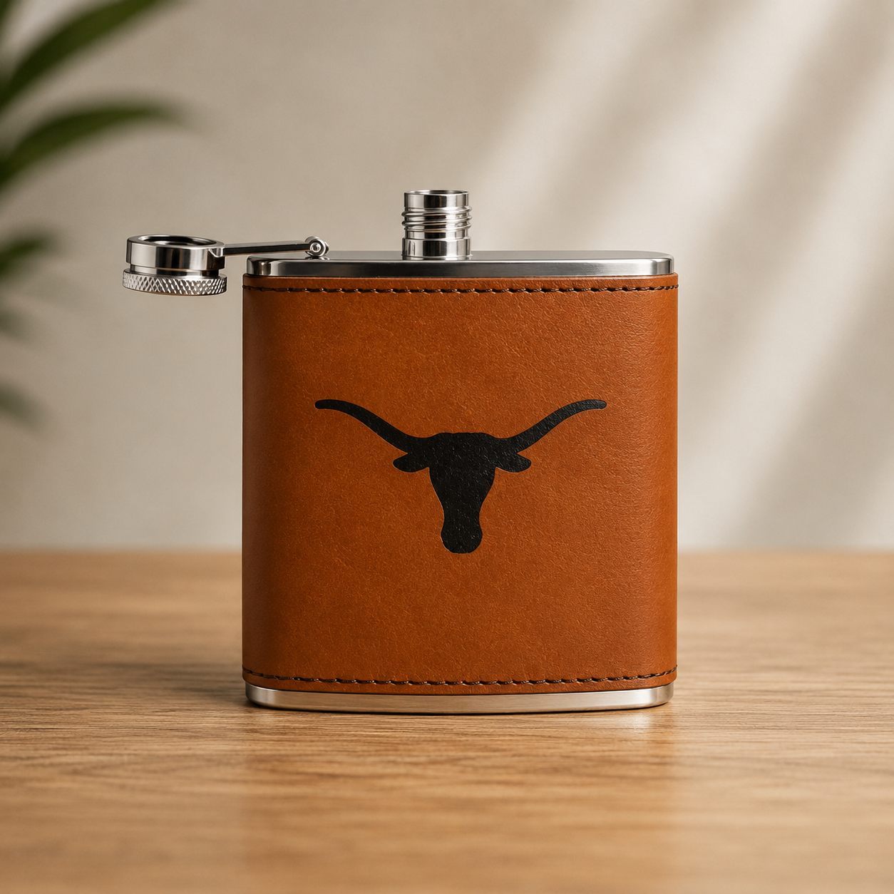 Texas Longhorns leather flask with tan wrap and black longhorn silhouette on Tampa Home & Garden Store