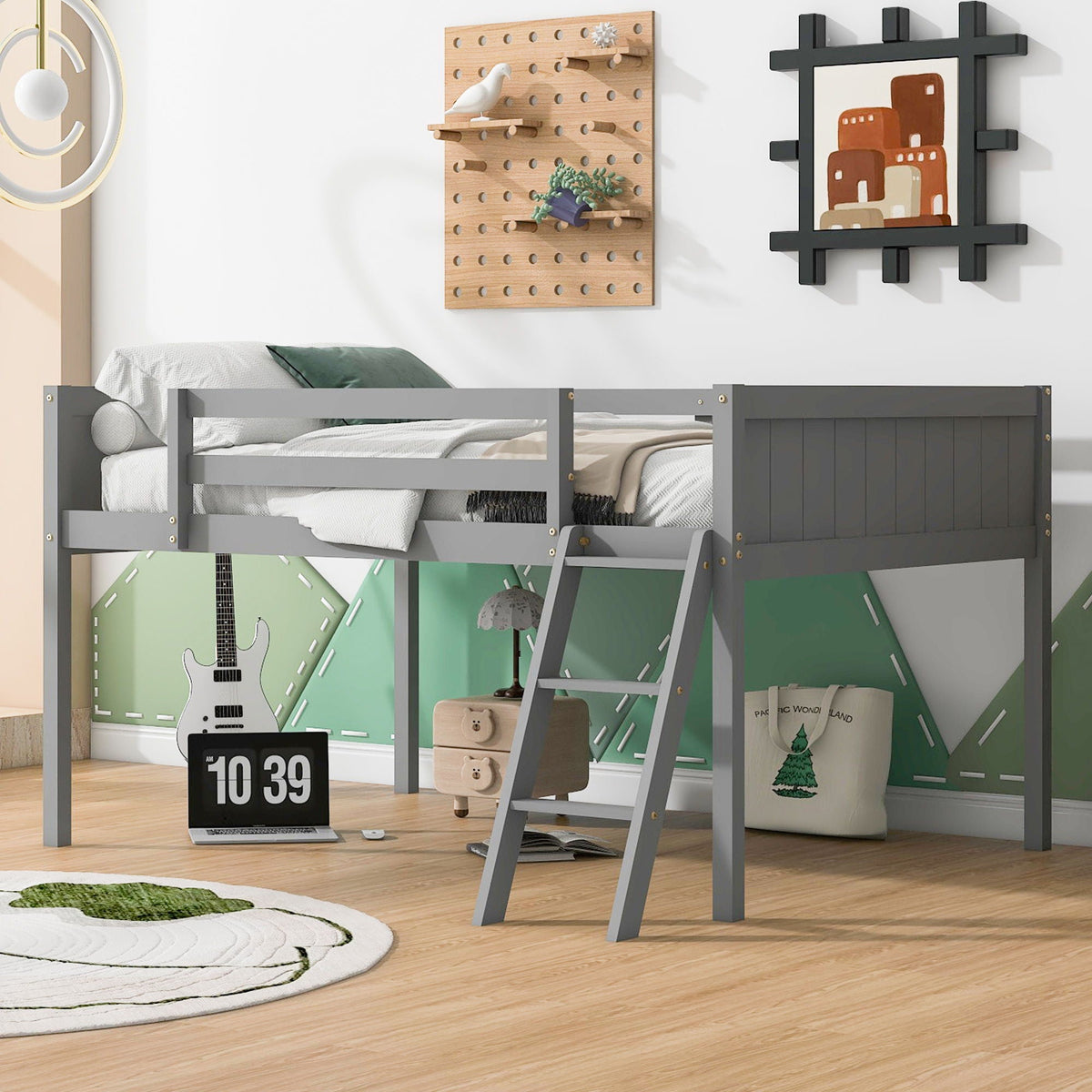Low loft bed with adjustable ladder in gray over a desk area with pegboard wall on Tampa Home & Garden Store