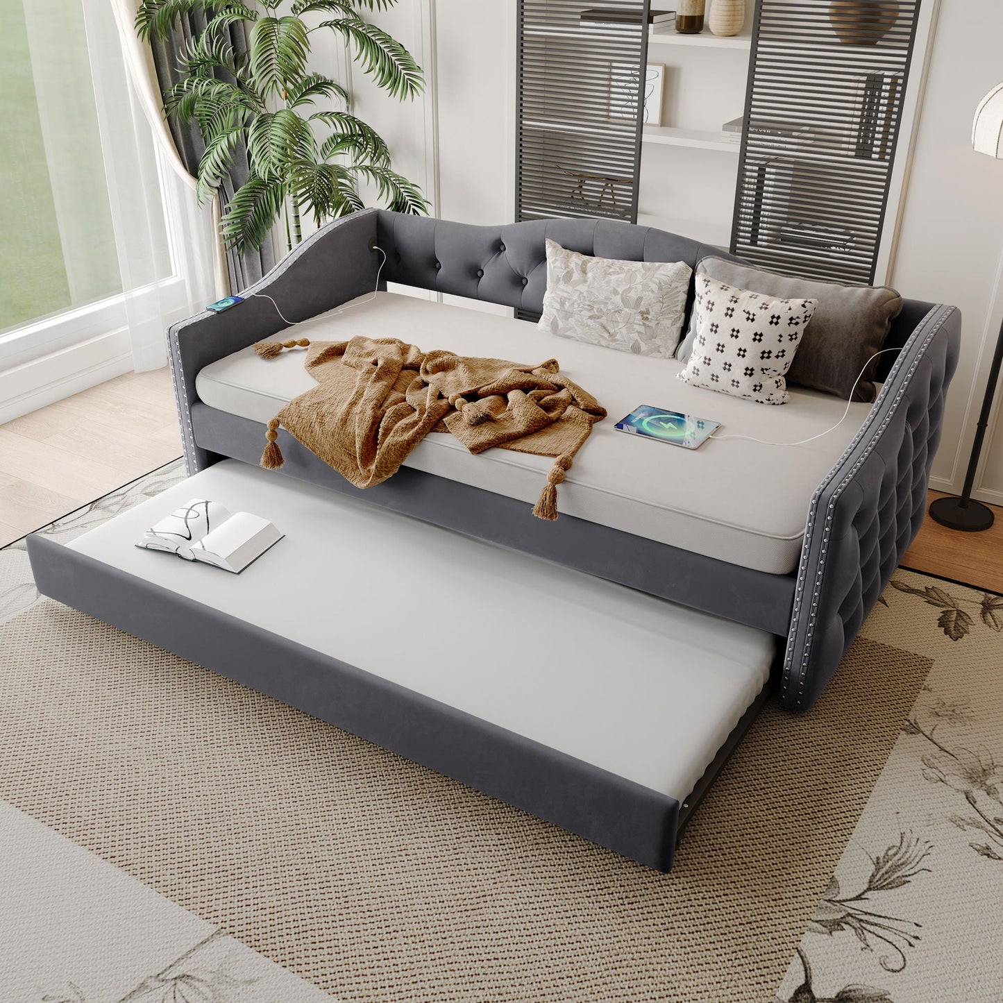 Gray twin size upholstered daybed with tufted arms and USB charging, includes trundle on Tampa Home & Garden Store