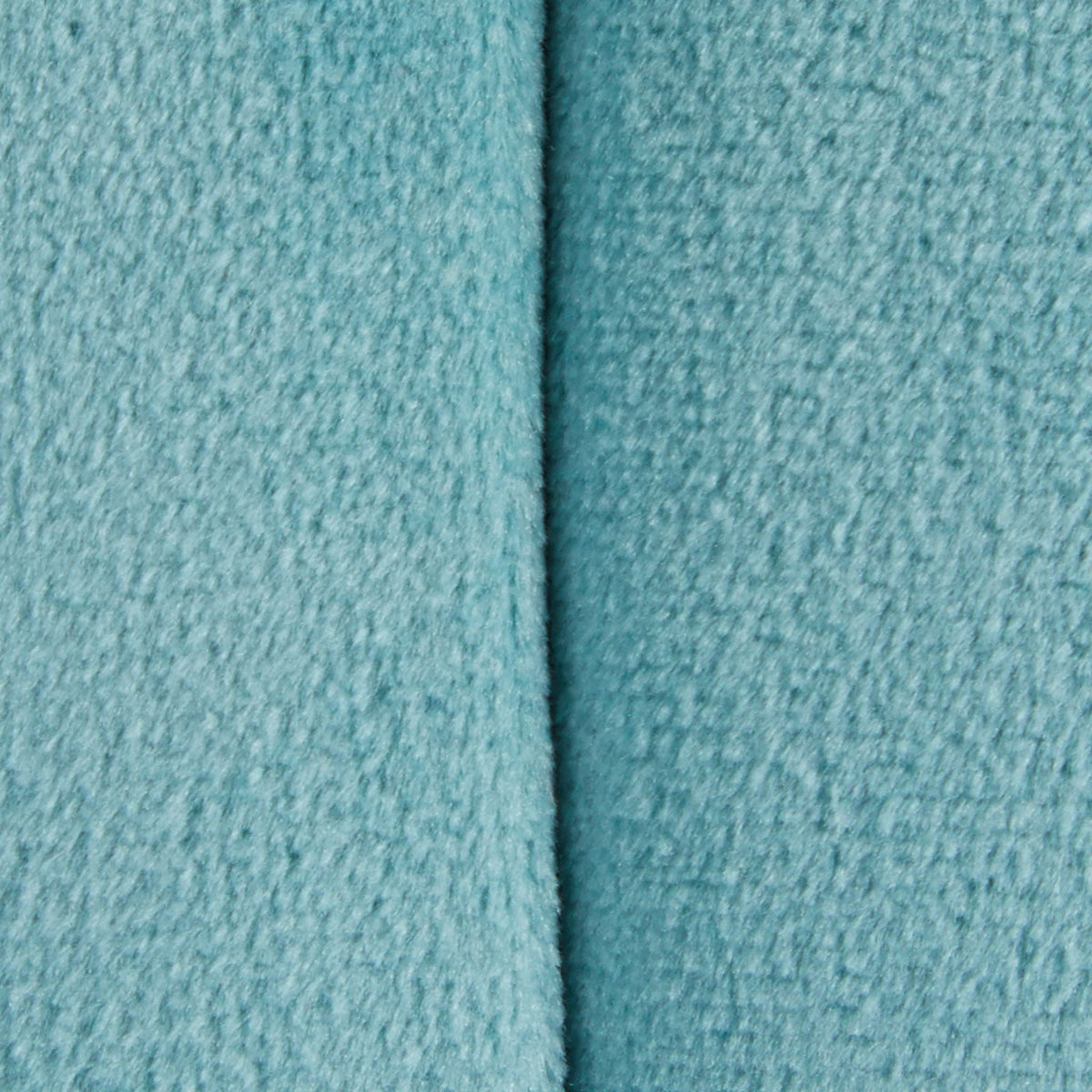 Accent ottoman fabric close-up in teal plush texture with seam by HouseOfZazla on Tampa Home & Garden Store