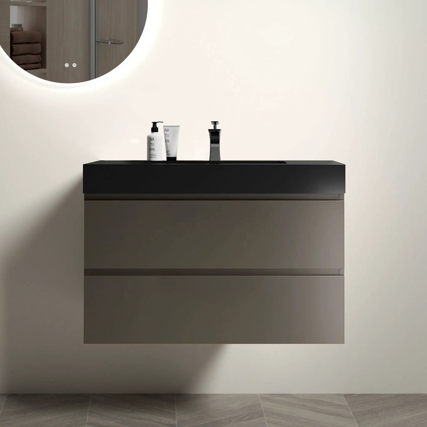 Alice bathroom vanity with sink, floating black unit with large storage, round mirror on Tampa Home & Garden Store
