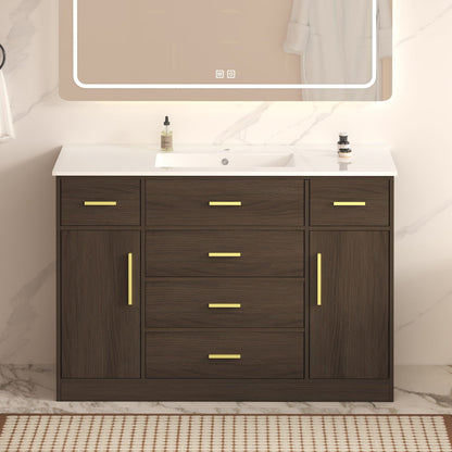 Bathroom vanity with soft close drawers in dark walnut, white countertop, gold hardware on Tampa Home & Garden Store