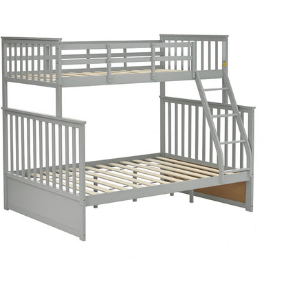 Gray bunk bed with ladder and safety rails; top bunk has rails, bottom bunk with slatted base on Tampa Home & Garden Store