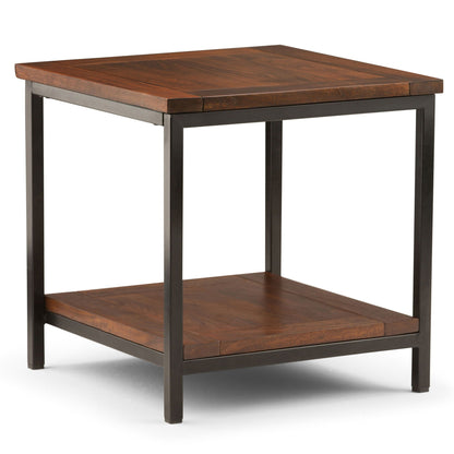 Handcrafted mango wood and black metal coffee table with warm brown top on Tampa Home & Garden Store