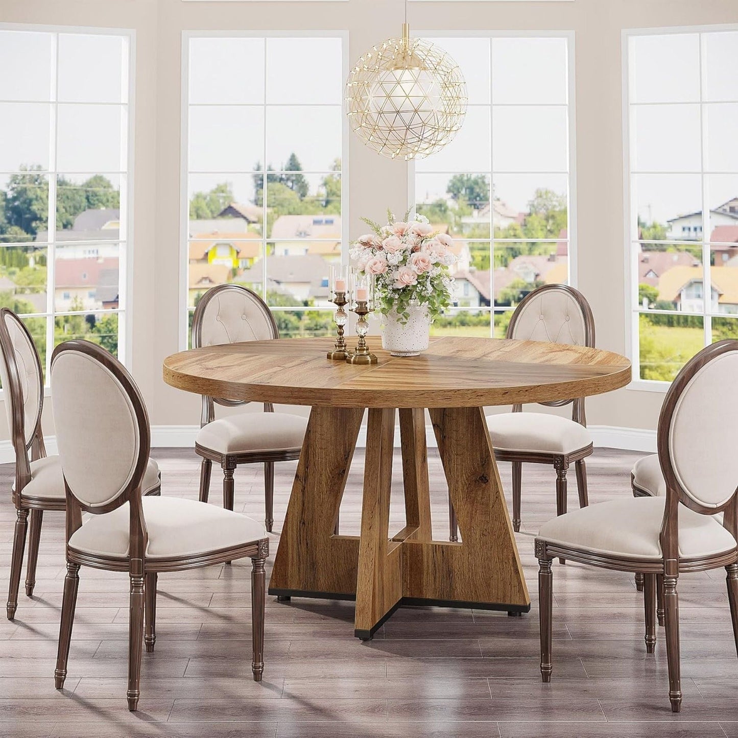 Round dining cross-base kitchen table with six upholstered chairs in natural wood on Tampa Home & Garden Store