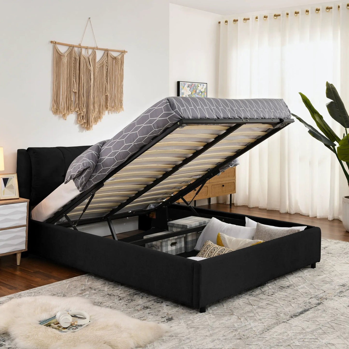 Unique Piece Furniture hydraulic bed with integrated headboard in gray fabric showing lift on Tampa Home & Garden Store