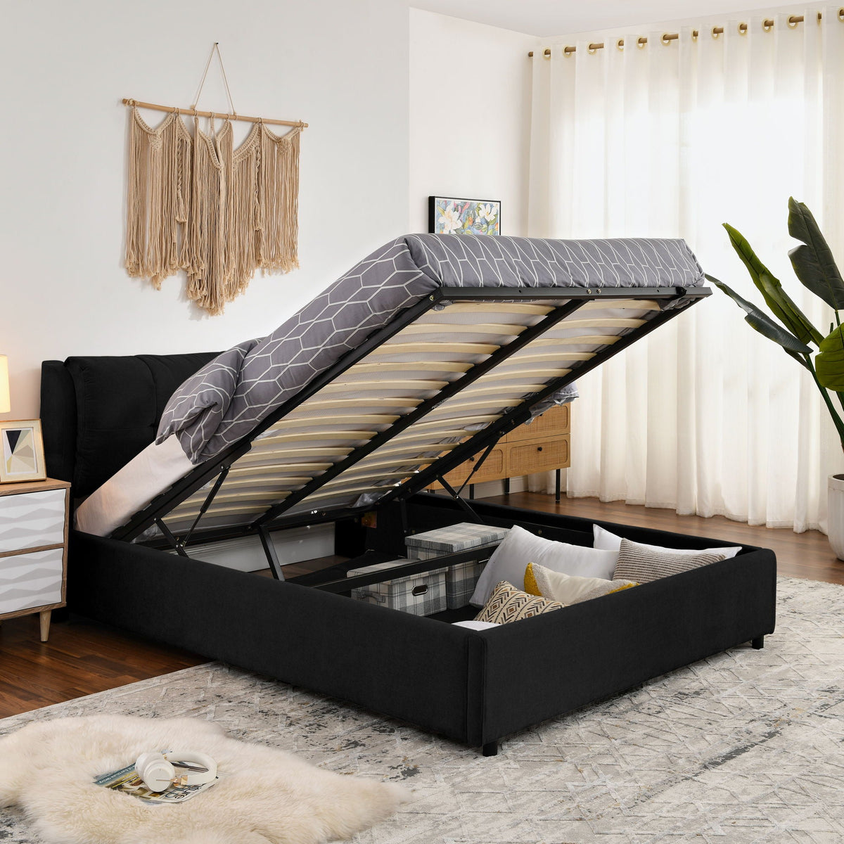 Storage upholstered platform bed with integrated headboard lifting to reveal under-bed bags on Tampa Home & Garden Store