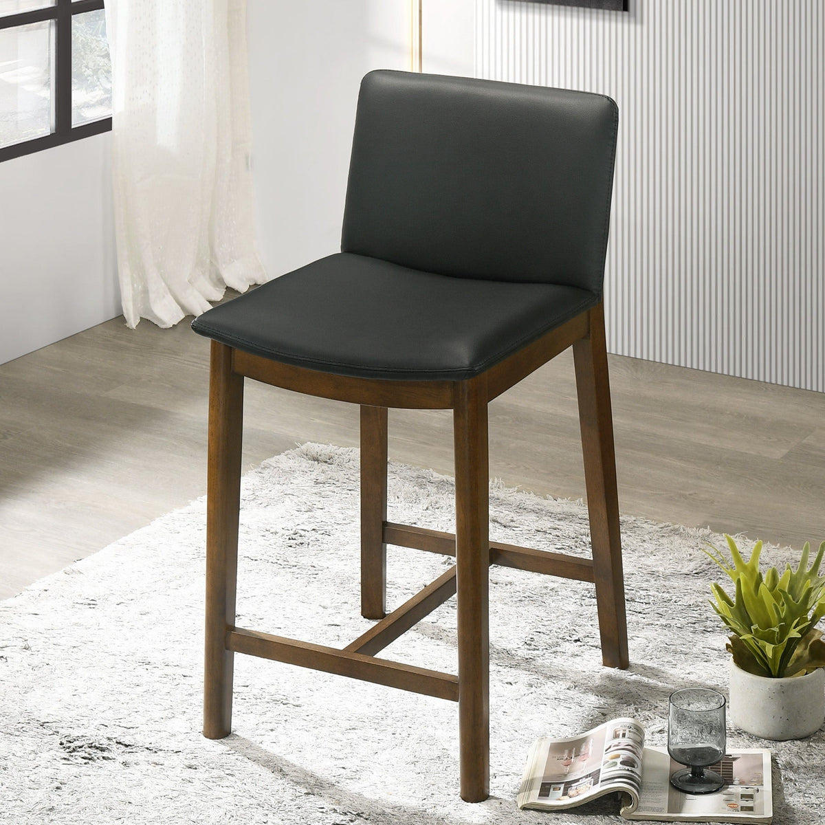 Mid-Century Counter Chair with Full-Back in black leather, wooden legs on Tampa Home & Garden Store
