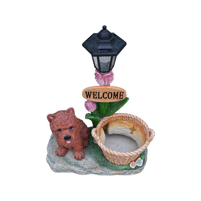 Sitting Puppy Solar Planter statue with brown pup, flowers and a black lantern on a stone base on Tampa Home & Garden Store