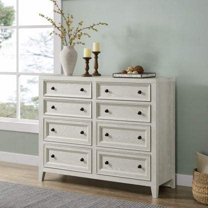 8-drawer dresser in whitewashed gray wood with framed fronts and black knobs on Tampa Home & Garden Store