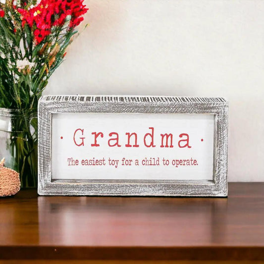Grandma humor sign in distressed white wood frame with red text Gia Roma farmhouse decor on Tampa Home & Garden Store