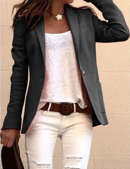 Candy-colored suit jacket with black blazer over white top and white ripped jeans on Tampa Home & Garden Store