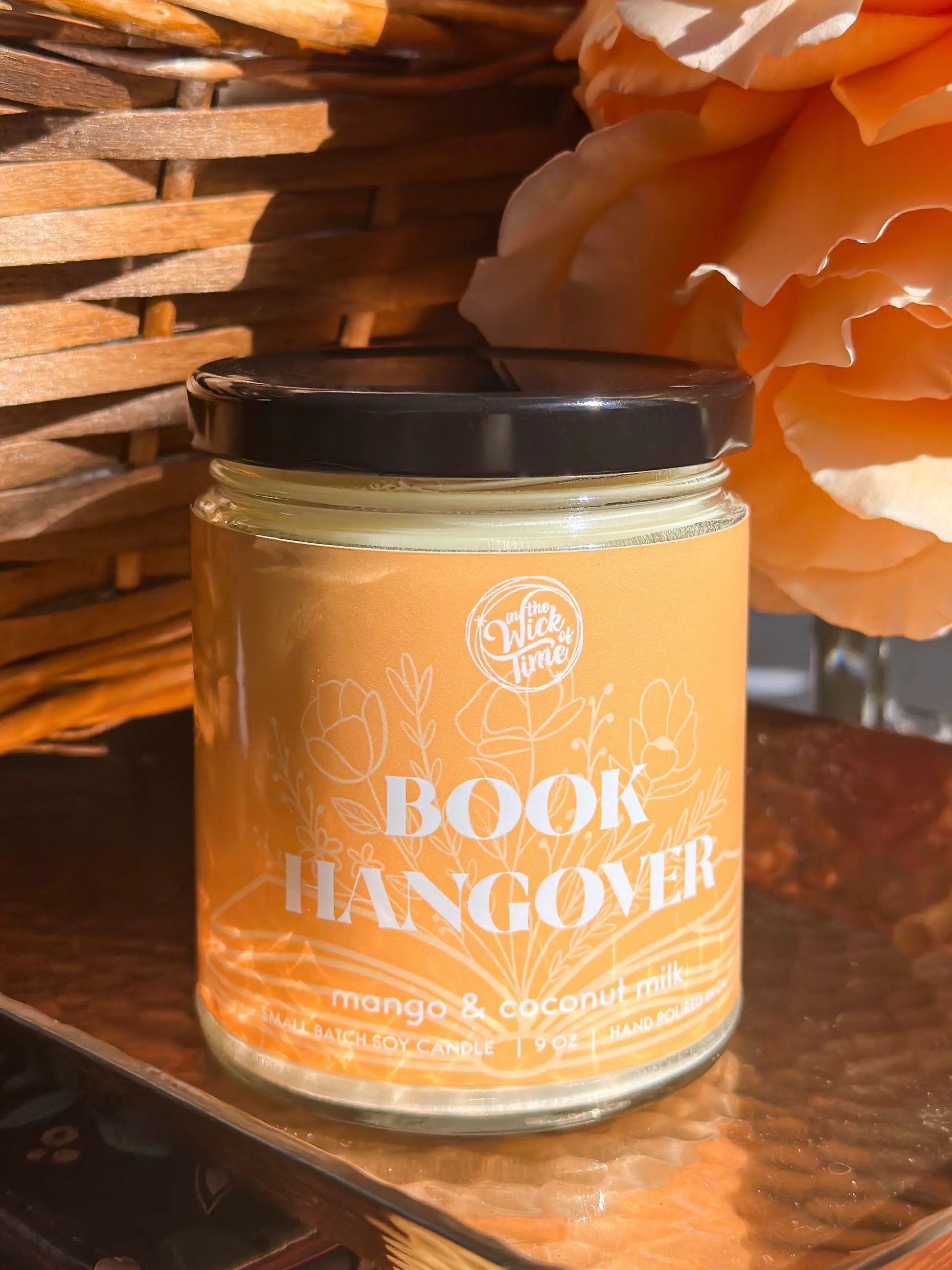 Book Hangover candle in jar with black lid, mango coconut scent by In the Wick of Time on Tampa Home & Garden Store