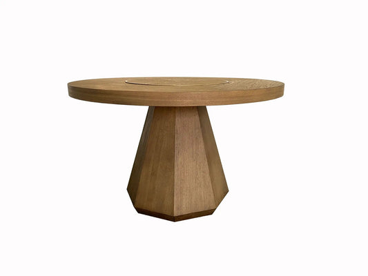 Elegant round dining table in warm oak finish with circular inset top and faceted pedestal base on Tampa Home & Garden Store