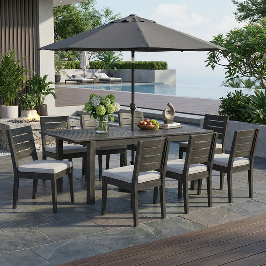 9-Piece dining set with extendable acacia table and cushioned chairs under umbrella on Tampa Home & Garden Store