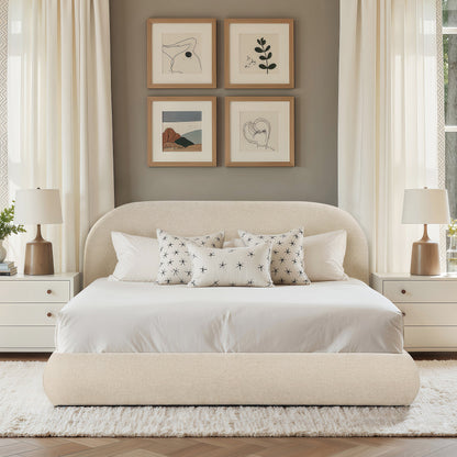 Archie Puffy Grounded Upholstered Platform Bed in oatmeal light with white nightstands on Tampa Home & Garden Store